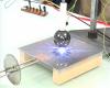 Test électrostatique réalisé grâce à une boule électrostatique. Cette photo montre la décharge électrostatique générée par la boule.